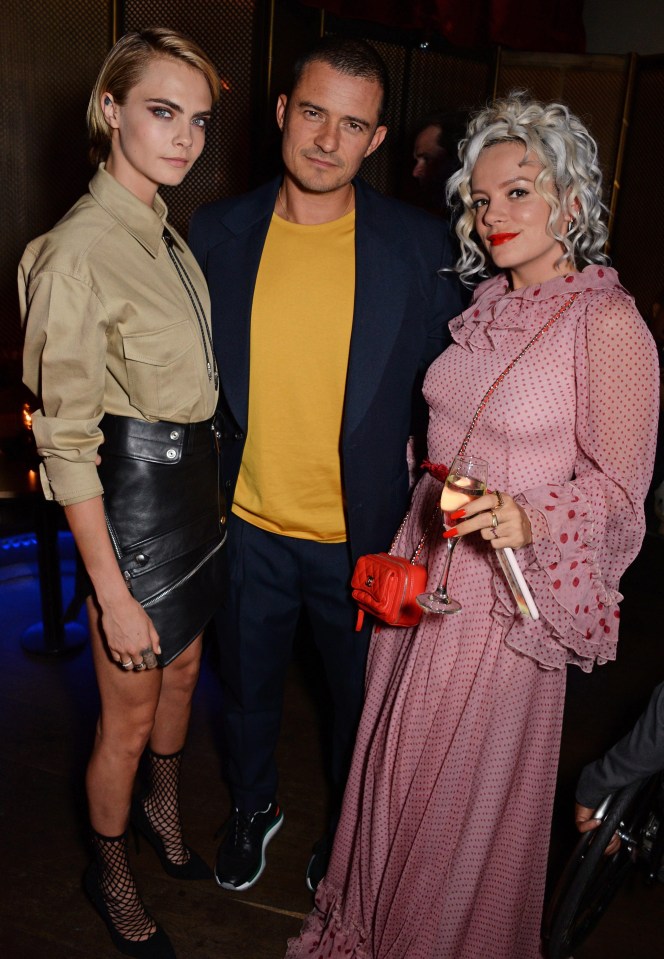 Supermodel Cara Delevingne with Hollywood heart-throb Orlando Bloom and pop star Lily Allen snapped in Soho, central London, on Tuesday