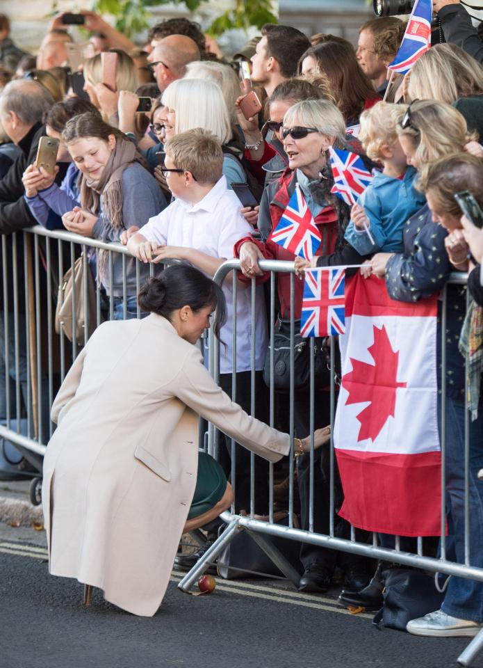  Well-wishers waved Union Jacks - while one bought a Canadian flag for the American actress, who's recently moved to London from Toronto