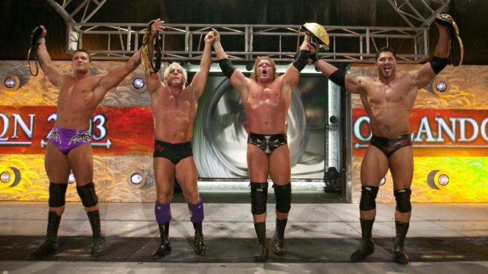  Batista, right, will join Randy Orton, Ric Flair and Triple H (left to right) for an Evolution reunion this month