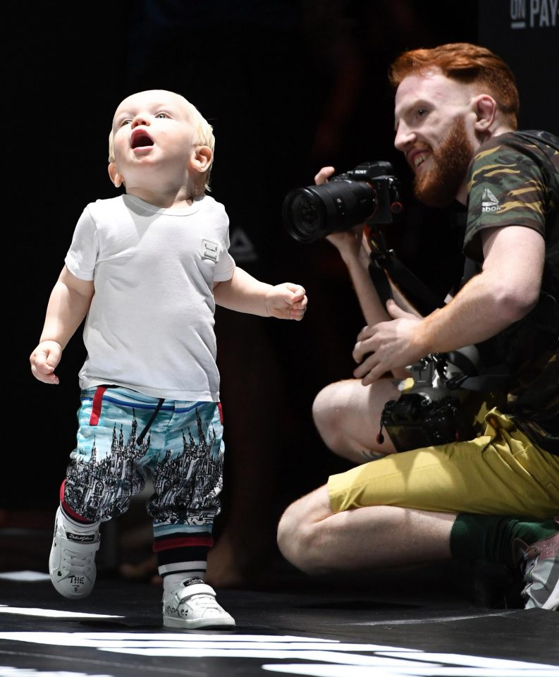  The youngster upstaged his father when he appeared on stage