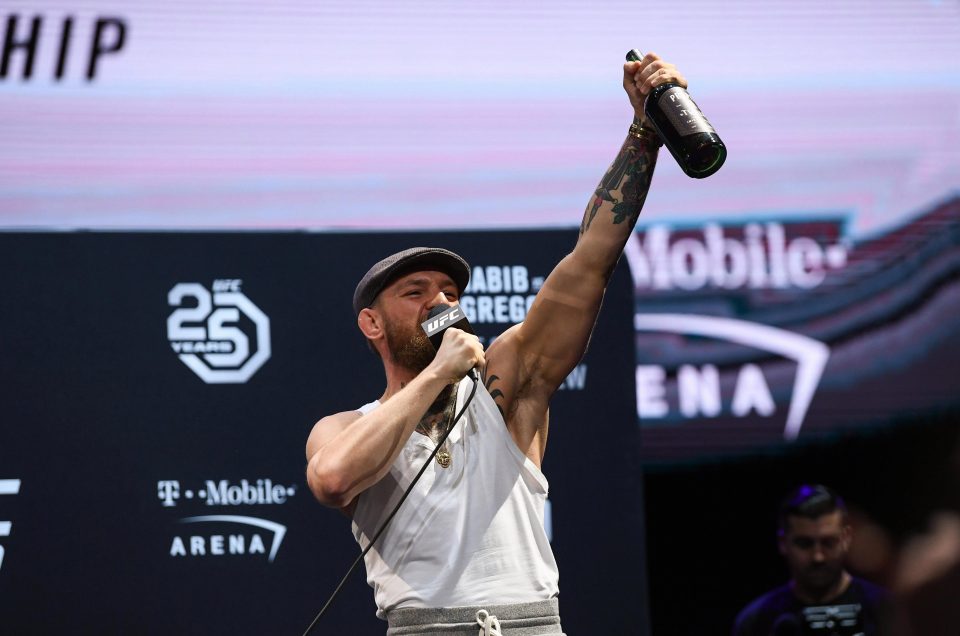  The 30-year-old raised a bottle of his new whiskey in the air during a entertaining press conference in Vegas