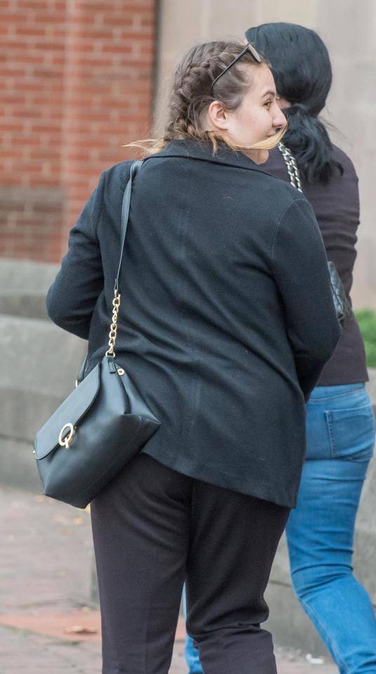  Harris looks round her shoulder as she leaves the court