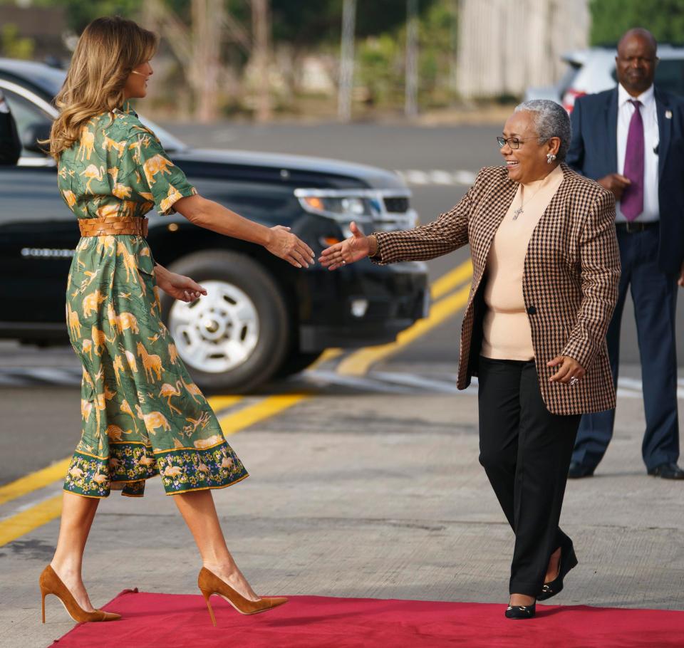  Melania is greeted by Margaret Kenyatta, wife of Kenyan President Uhuru Kenyatta