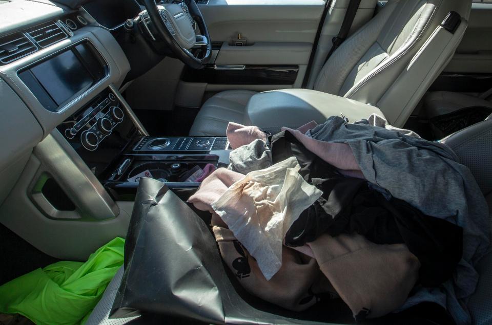  The passenger seat of Katie Price's car was covered with clothes and bags