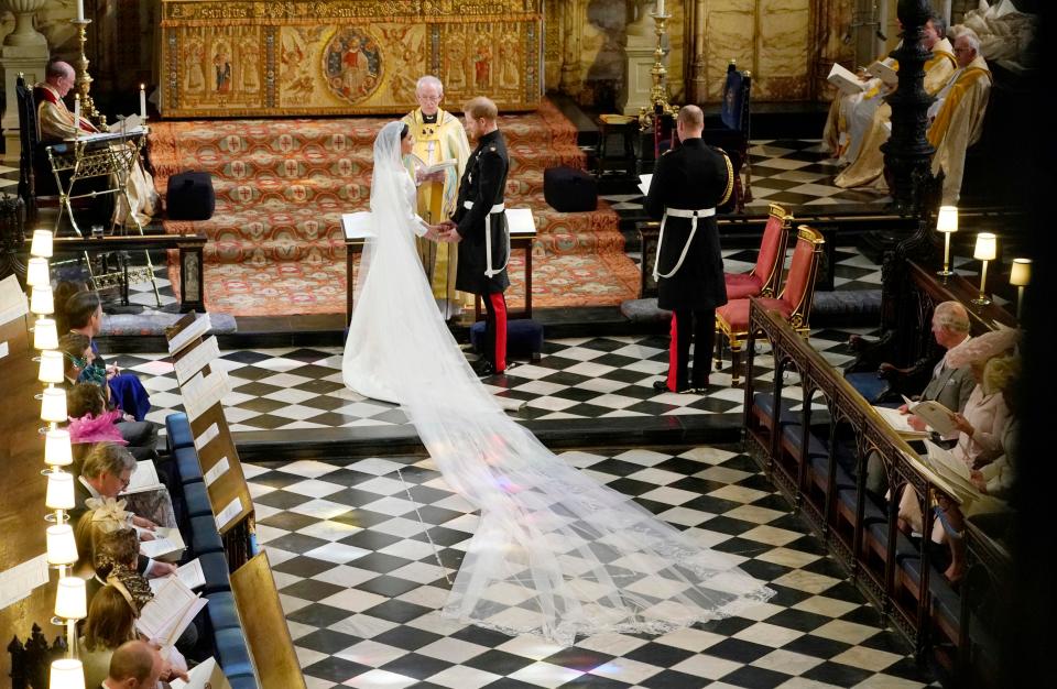  Her jaw-dropping 15ft embroidered veil lined the aisle of St George's Chapel, where Eugenie and Jack wed today