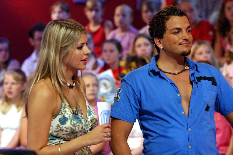 A very young Holly is seen here in 2005 with a very young Peter Andre