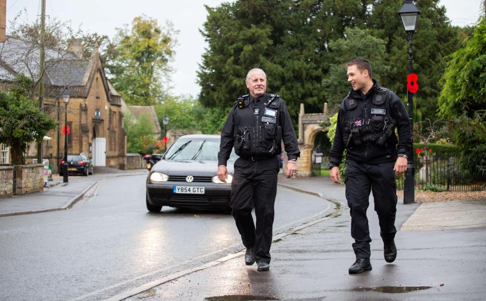  The two men share a joke out on the beat. Spirit and Sam have the power to make citizens' arrests and are trained to use handcuffs