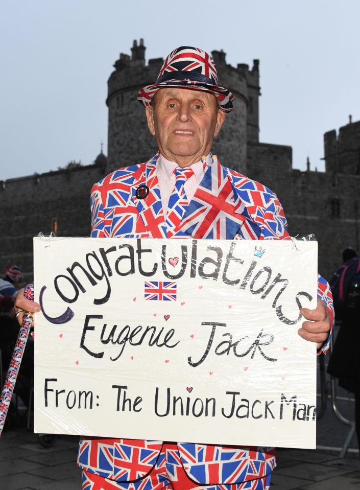  Terry Hutt posed with a sign congratulating Princess Eugenie