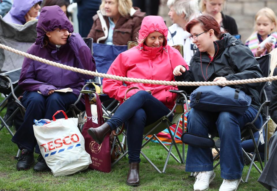  Crowds braved the cold and strong winds on Friday morning