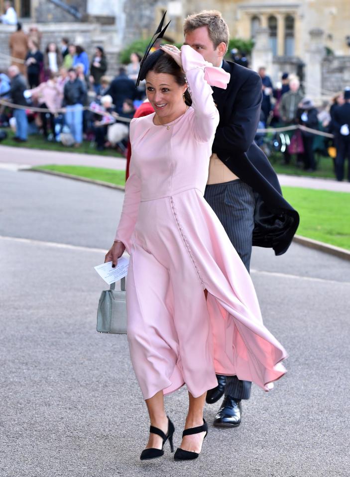  Guests were forced to cling onto their headpieces so they didn't blow away