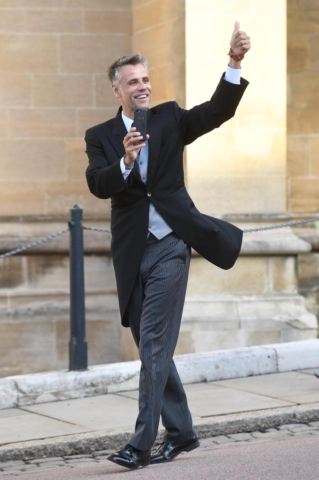  TV and radio presenter Richard Bacon waved as he headed into the chapel