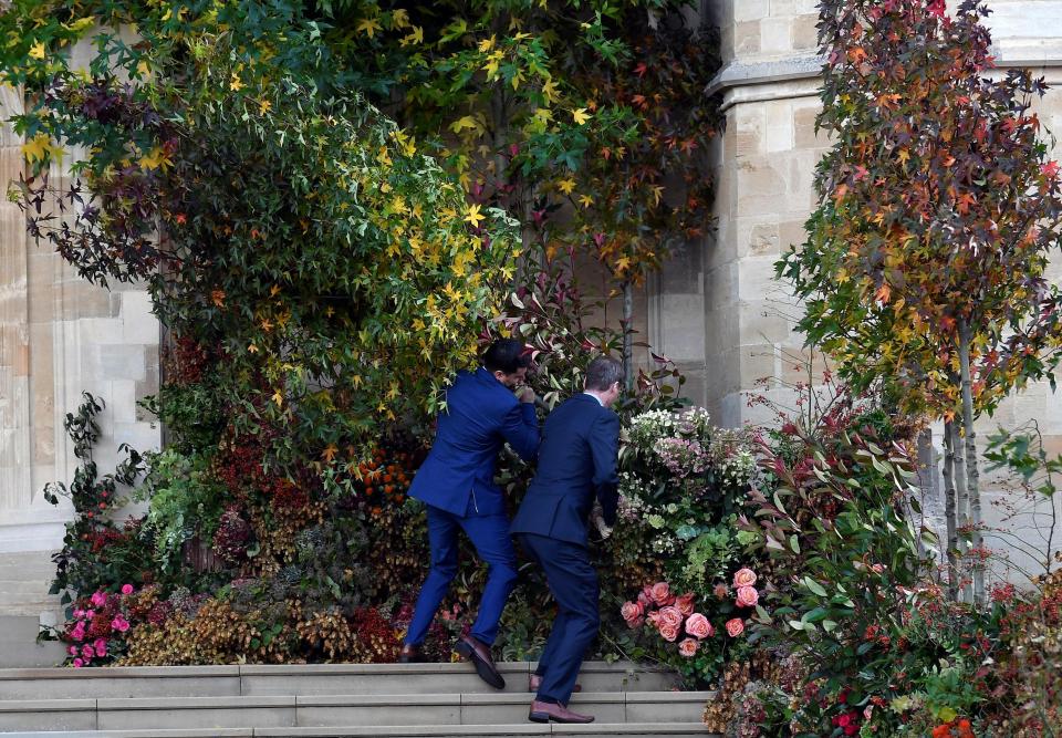  People tried to fix the foliage outside the chapel after strong winds hit the town