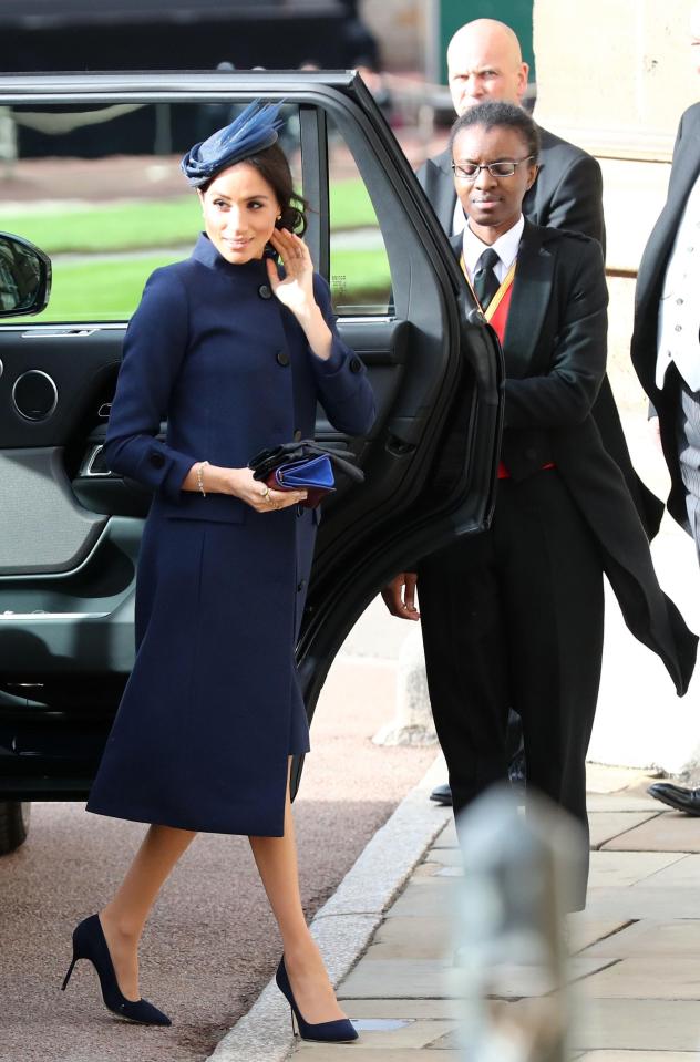  Meghan looked elegant in a bespoke Givenchy navy dress