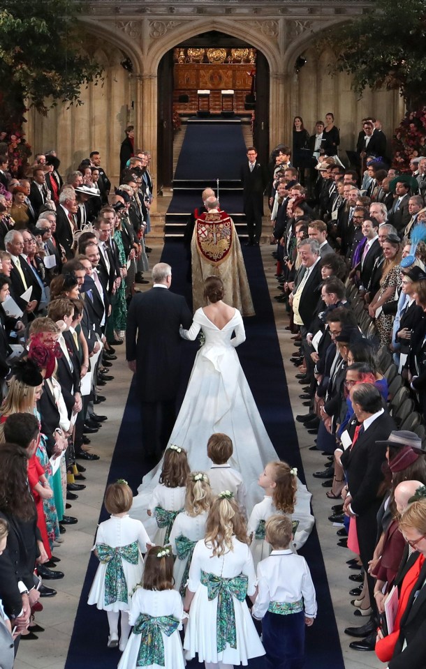 Eugenie was walked down the aisle by the Duke of York, accompanied by bridesmaids and page boys including Prince George and Robbie Williams’ daughter Teddy