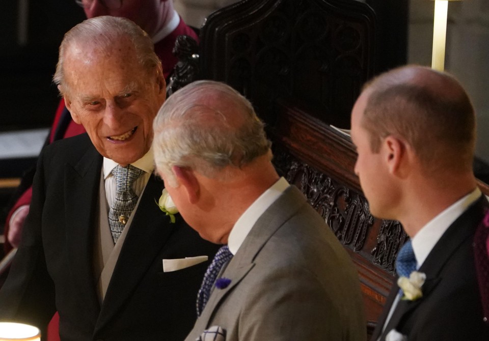 He appeared to share a joke with his son Prince Charles