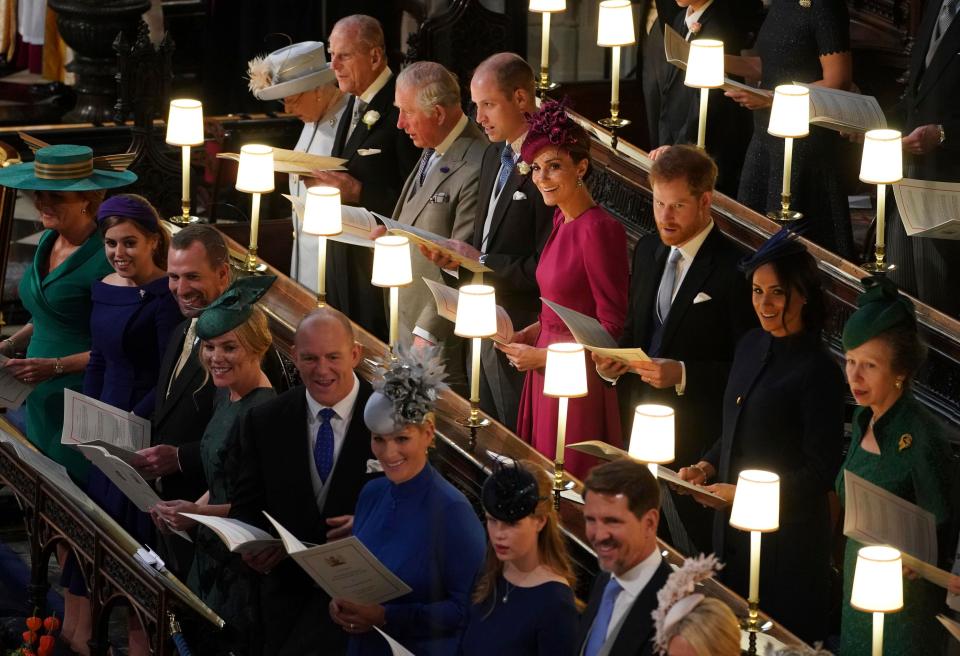  Back row from left: Britain's Queen Elizabeth II, Prince Philip, Prince Charles, Prince William, Kate, Duchess of Cambridge, Prince Harry, Meghan, Duchess of Sussex and Princess Anne, front row left to right, Sarah Ferguson, Princess Beatrice of York, Peter Phillips, Autumn Phillips, Mike Tindall, Zara Tindall, Lady Louise Mountbatten-Windsor and Crown Prince Pavlos of Greece