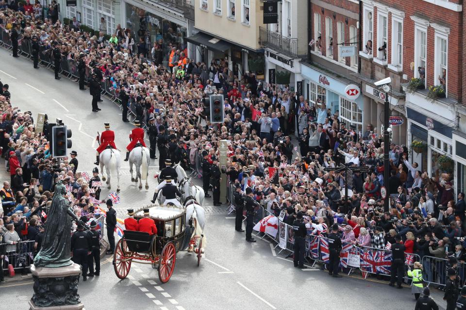  The couple were cheered by fans lining the streets of Windsor