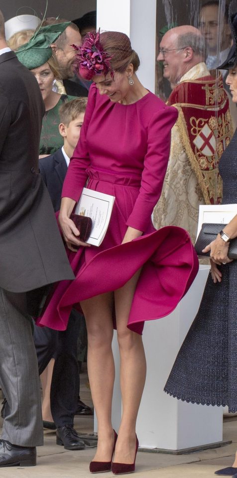  Kate's blushes almost matched her fuchsia dress when it lifted up Marilyn Monroe-style. The Duchess chose, 36, chose a prim Alexander McQueen number