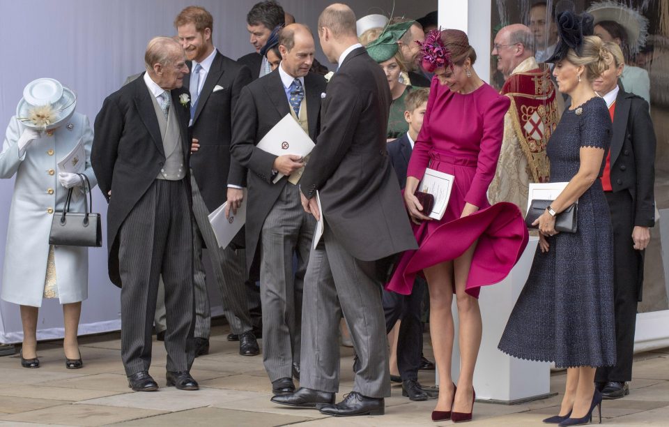  Kate handled the wind like a pro as she stood with other royals