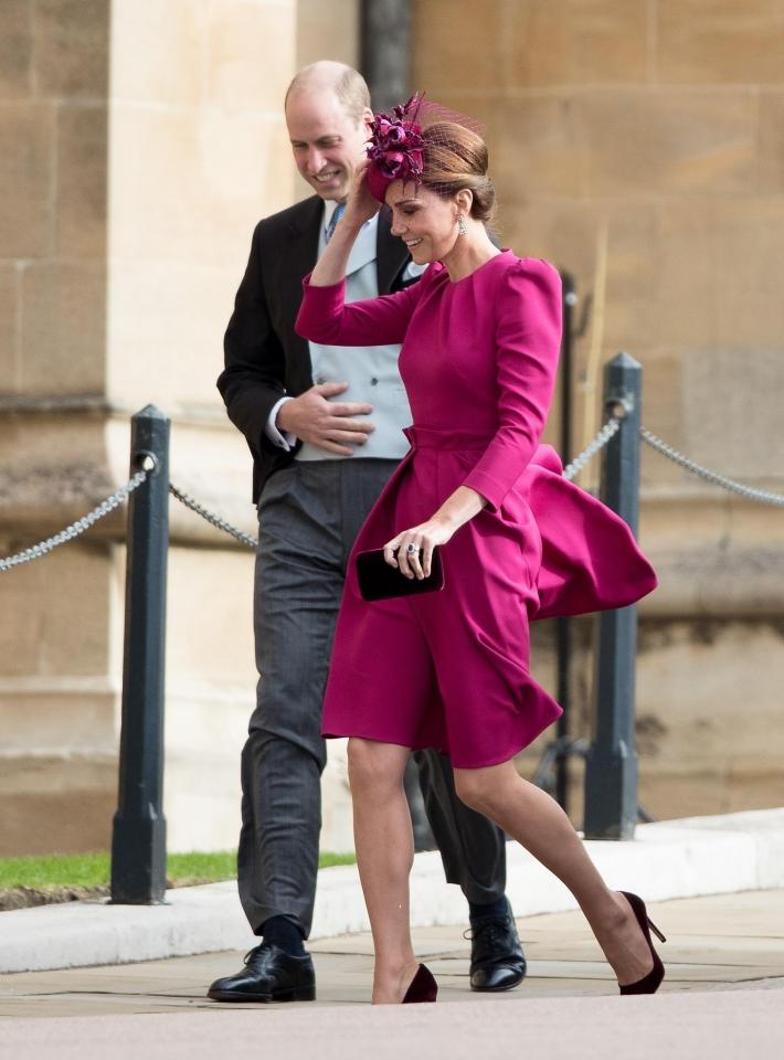  She teamed with a Philip Treacy hat with autumnal flowers, perfectly fitting the seasonal there of the flowers at St George's chapel