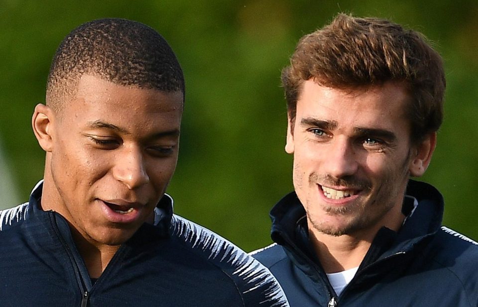  Kylian Mbappe, left, has plenty to smile about with Antoine Griezmann in training