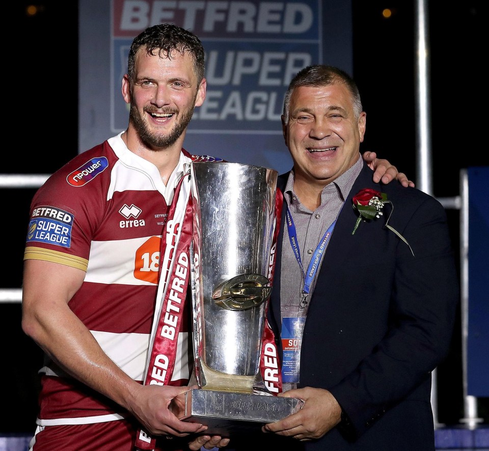 Wigan skipper Sean O'Loughlin, left, and head coach Shaun Wane celebrate Grand Final victory