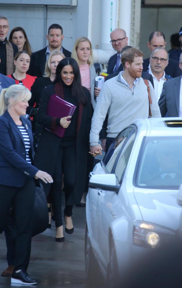  The couple were cheered by crowds outside the airport