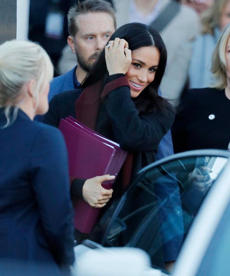  Meghan beamed with joy as she landed in Sydney