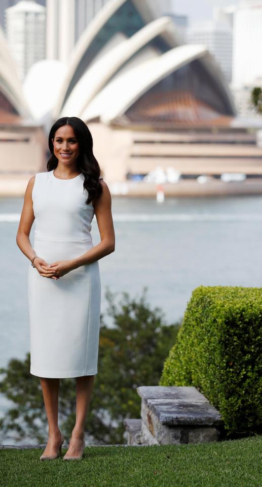  Earlier in the day, she wore a £1k white dress by Aussie designer Karen Gee