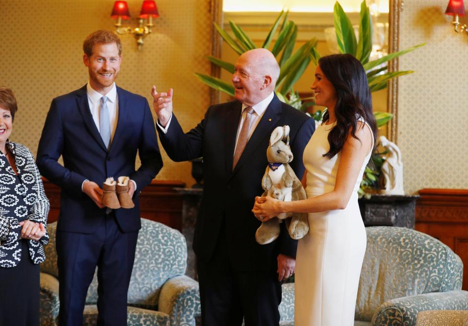  Meghan beamed that it was the first gift for their unborn child