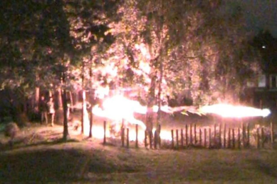  Young teens can be seen playing with fireworks on the estate