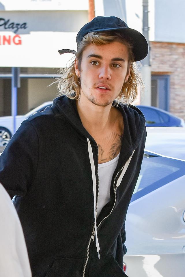  Justin has apparently been in a hair-growing competition with pals