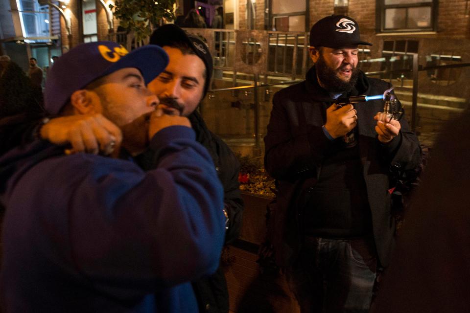  People smoke cannabis on the street in Toronto last night