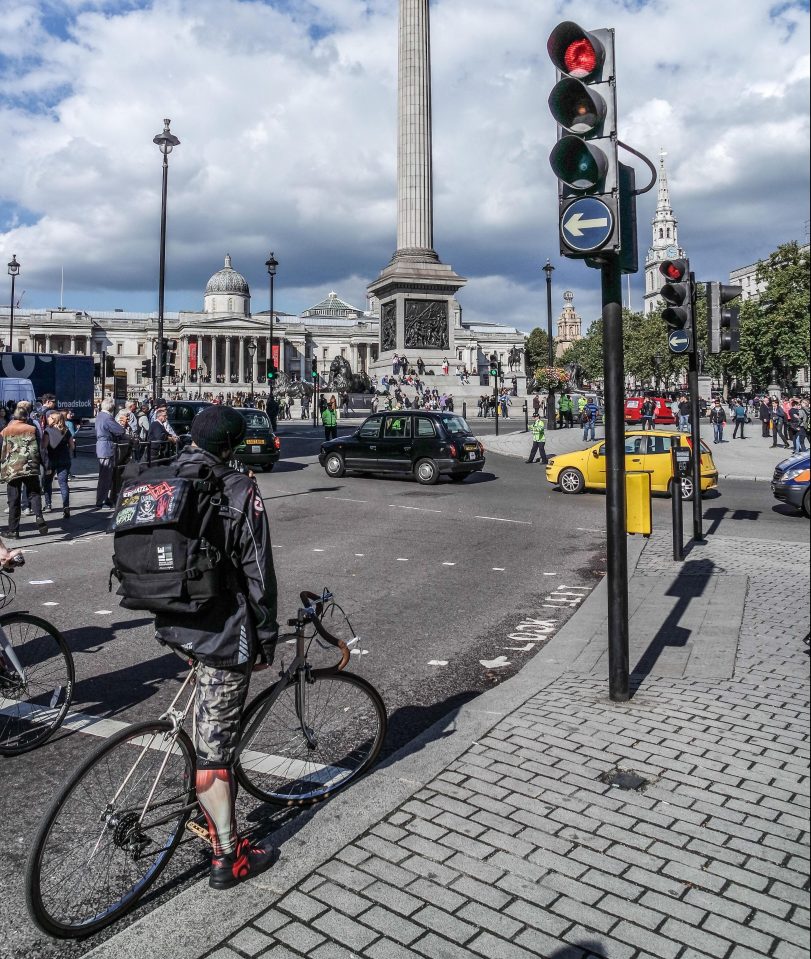  Cyclist are required to stop behind white lines at red lights or face a fine