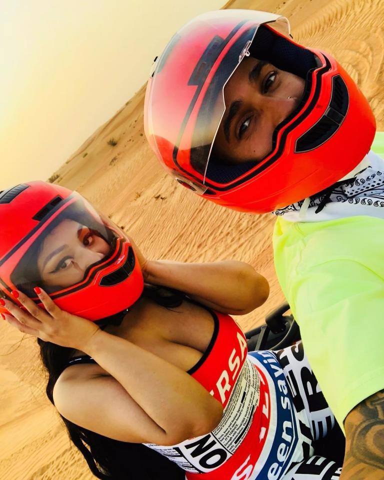  Nicki and Lewis Hamilton set tongues wagging that they're dating after uploading snaps of them quad biking at sunset in Dubai