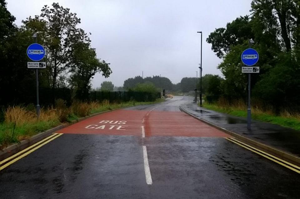 Drivers have no choice but to cross into the bus-only road if they accidentally take the wrong exit