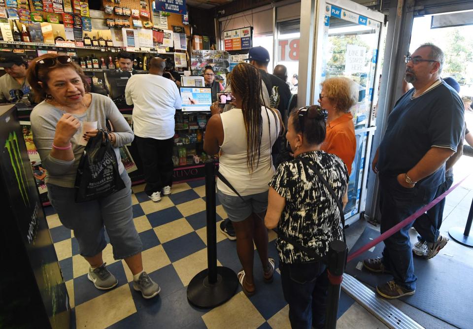  One shop worker said the queue of people buying tickets didn't stop all day