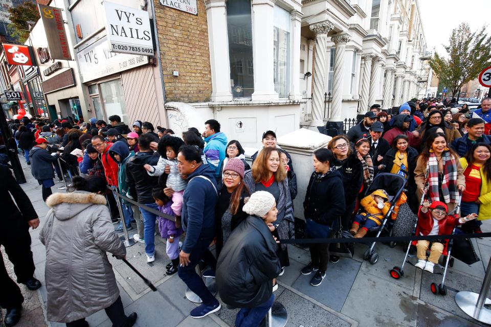  Fans waited patiently as they queue round the block for the outlet to open at 8am