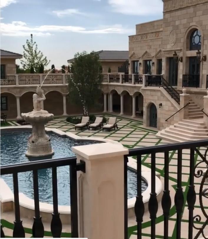  The palatial grounds include a giant courtyard and water fountain