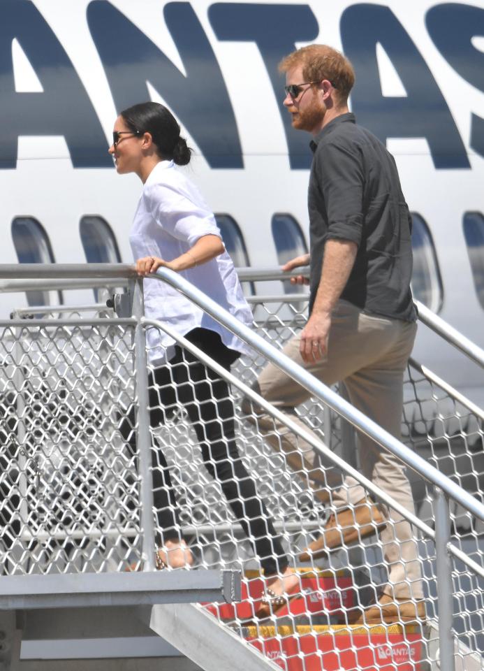  Harry and Meghan board the plane at Hervey Bay Airport on Fraser Island