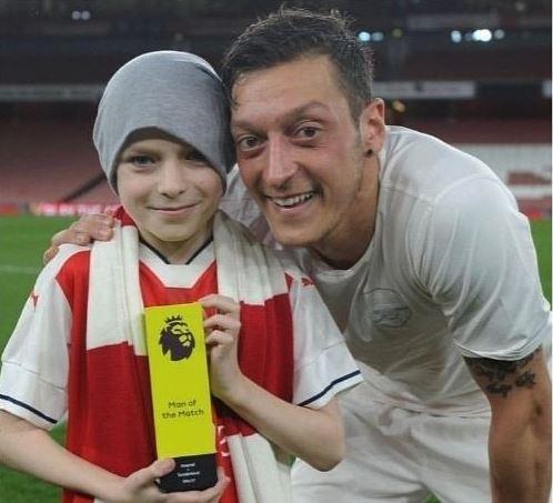  Mesut Ozil has been left heartbroken after the death of a young fan