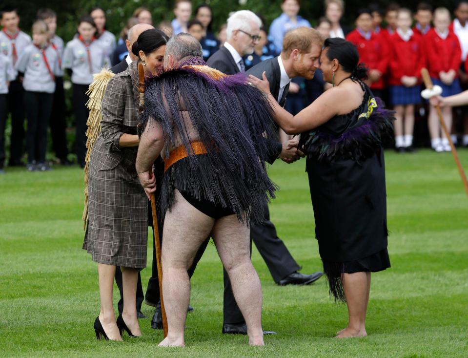  Meghan and Harry receive a traditional Maori welcome on the lawns of Government House in Wellington