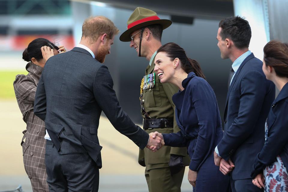  Harry and his wife Meghan are welcomed by New Zealand's Prime Minister Jacinda Ardern