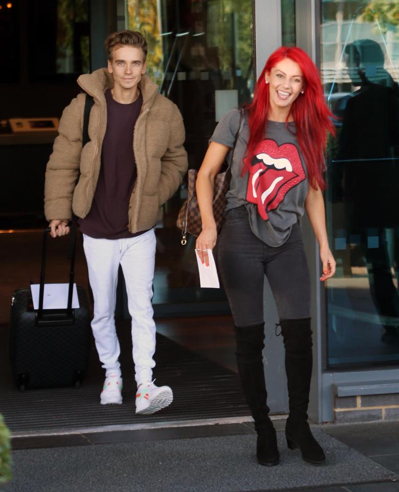  Strictly's Dianne Buswell was all smiles as she left a hotel with Joe Sugg today