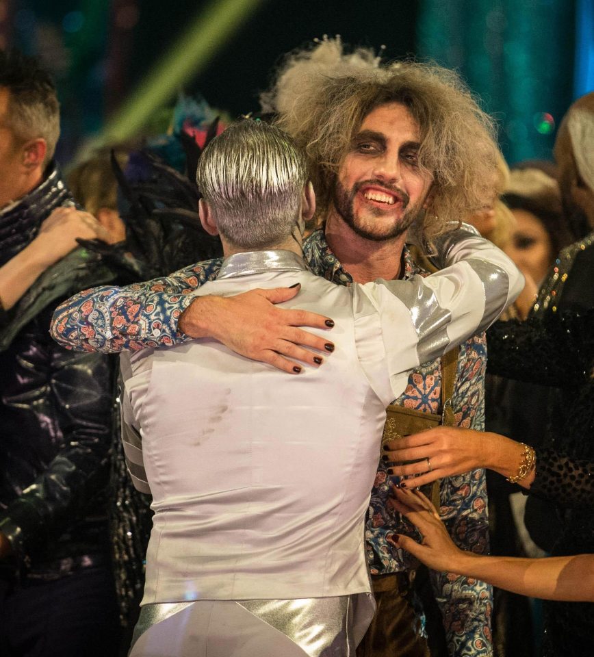  Seann gets a hug from one of his fellow competitors