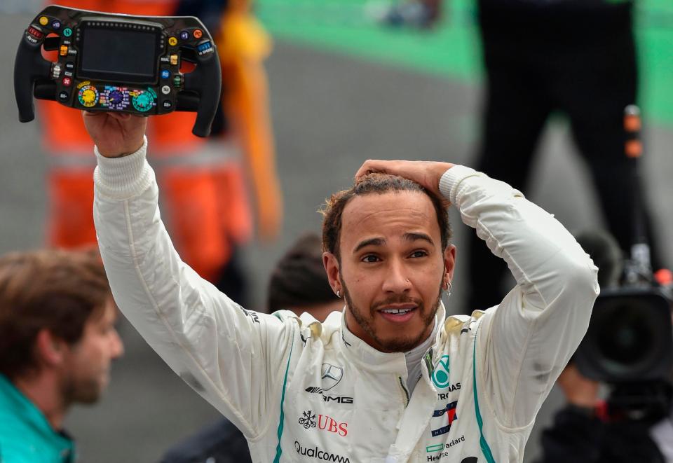  Lewis Hamilton celebrates winning his fifth world title