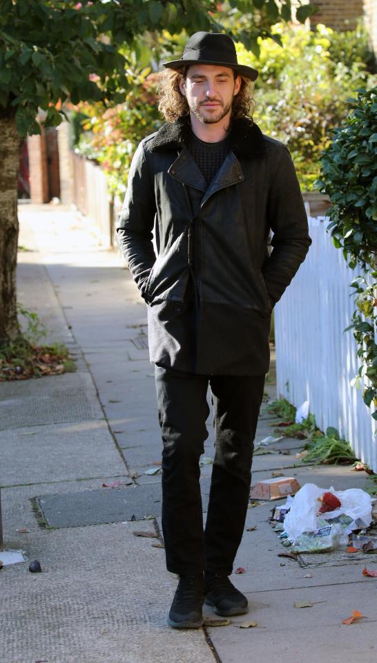  Seann Walsh cut a sombre figure on a sunny stroll through West London today