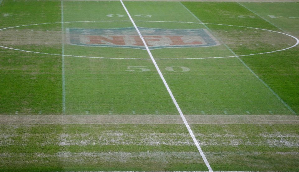  The pitch is worn, patchy and still bears the NFL logo in the centre-circle