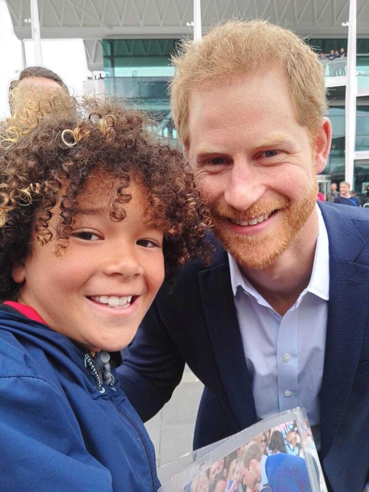  Max Henry, 10, met Prince Harry during a walkabout at the Viaduct Harbour in Auckland