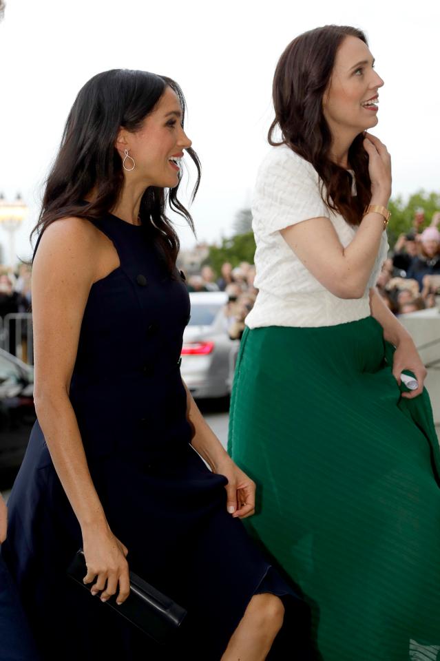  Meghan and New Zealand's PM Jacinda Ardern make their way to the reception